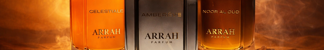 ARRAH perfume bottles on a decorative tray with a warm, brown background.